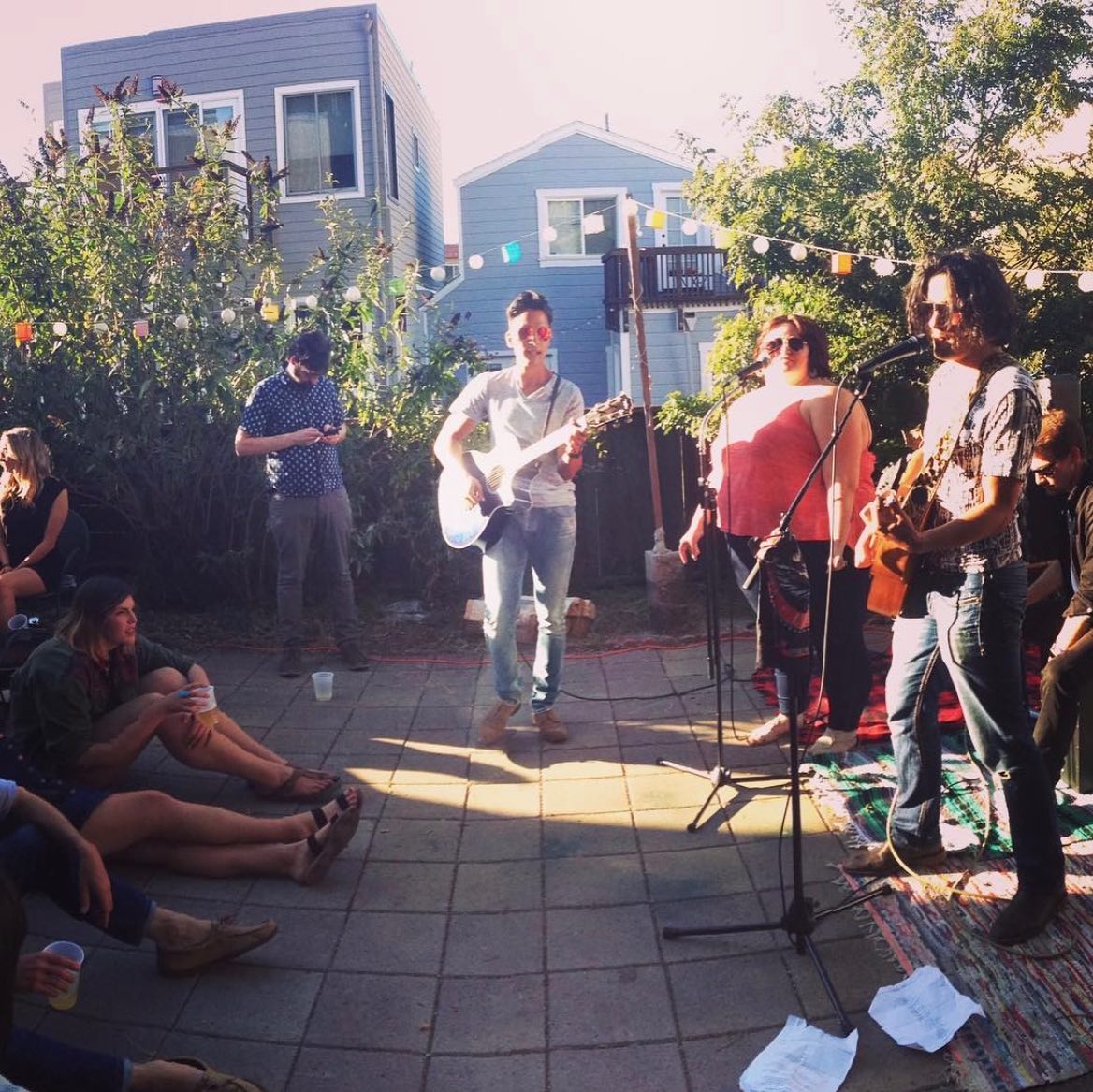 Two musicians performing an acoustic duo set