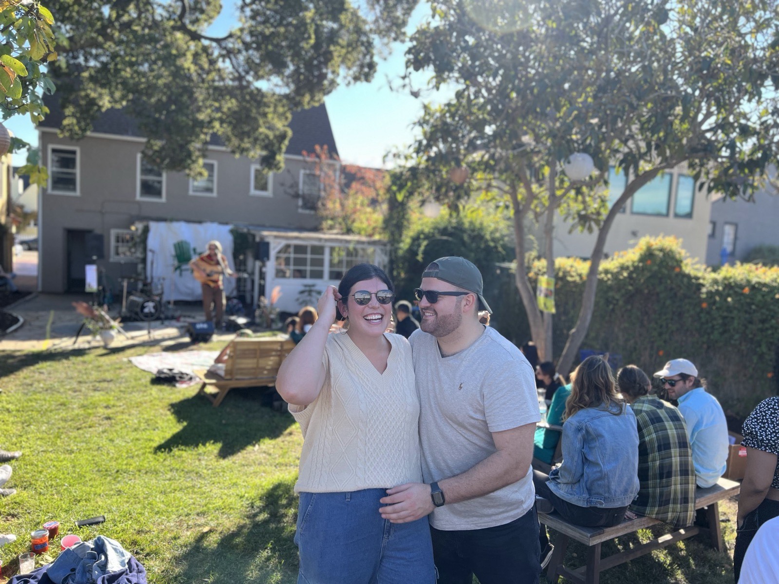 Friends laughing together in the crowd